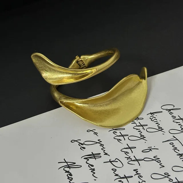 Metal leaf shaped flower bracelet