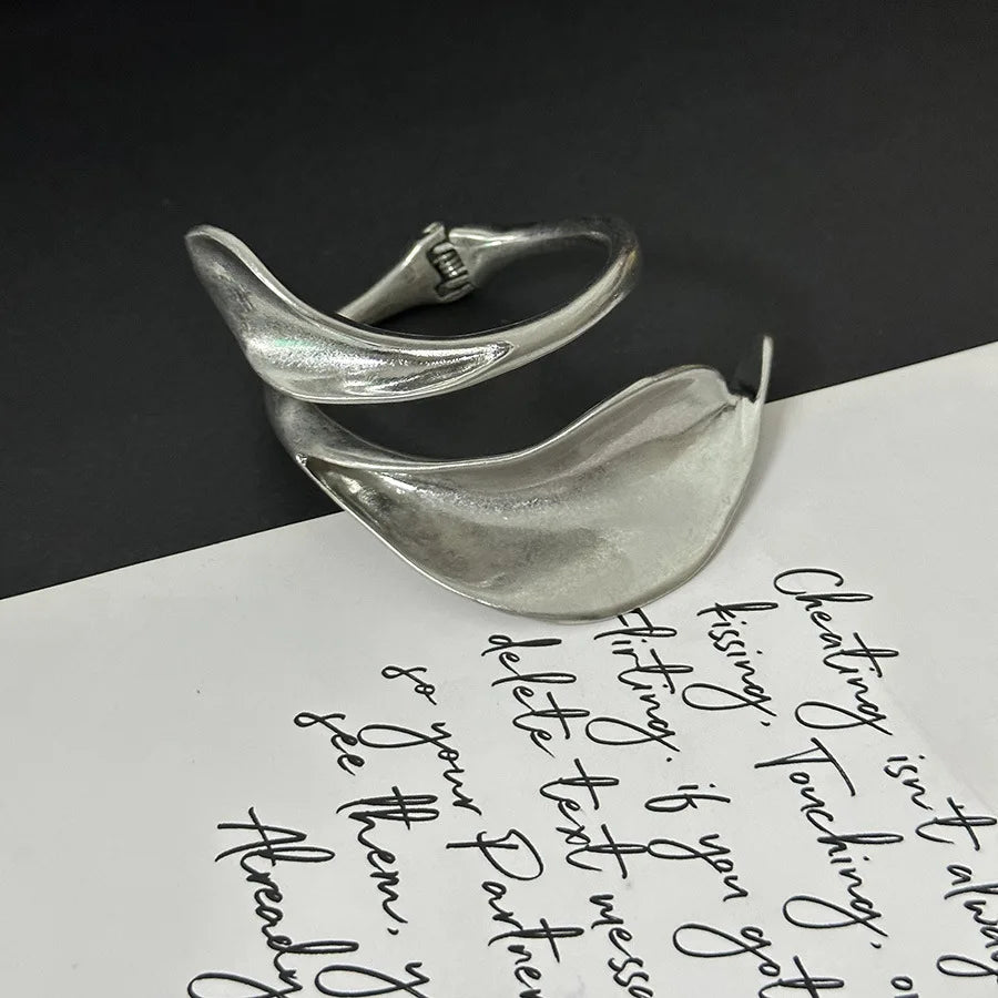 Metal leaf shaped flower bracelet